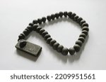 Small photo of Islamic prayer beads (Misbahas) consist 33 beads, to assist in glorification of God following prayers