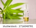 Glass Bottle With Cbd Oil On...