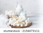 Fresh dairy products (milk, kefir, feta, cottage cheese, Mozzarella).Symbols of jewish holiday - Shavuot. Selective focus