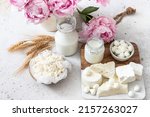 Small photo of Fresh dairy products (milk, kefir, feta, cottage cheese, Mozzarella).Symbols of jewish holiday - Shavuot