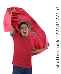 Small photo of Soccer fan with the flag of his country Morocco and jersey shouting with emotion for the victory of his team on a white background.