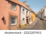 Small photo of Charming and quaint old town lane and colourful harling cottages in the medieval village of Culross, a popular filming location in Fife, Scotland, UK.