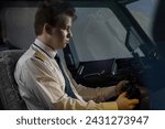 Small photo of Pilot skillfully navigates airplane with helm at night. Young captain ensures smooth and uneventful flight for all on board