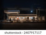 Small photo of Fort Mill, South Carolina, United States, 29 Dec 2023: Bossy Beulah's Chicken Shack in downtown Fort Mill, SC - Night-time charm with illuminated exterior and Southern flavors.