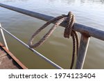 Ship Ropes Tied To Knot With...