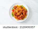 fried crispy chicken with sweet and sour sauce in Korean style