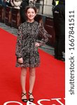 Small photo of London, United Kingdom- March 8, 2020: Ariella Glaser attends the "Radioactive" UK Premiere at the Curzon Mayfair in London, UK.