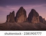 Small photo of Lavaredo, BL, Italy 10 10 2023: three peak of Lavaredo in the dolomites alps. italian alps of lavaredo. mountain landscape in sunset.