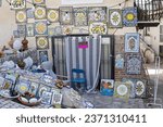 Small photo of September 1, 2023 San Felice Circeo, Italy. Colorful Mediterranean ceramics are sold on the streets of San Felice Circeo