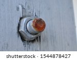 Rusty Red Bolt And Nut On A...