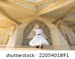 Small photo of Sufi Whirling Dervish in the Marmara Theology Mosque, Altunizade Uskudar, Istanbul Turkey