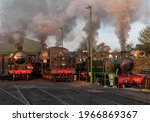 Small photo of Ropley, Hampshire, UK May 2021 Early morning ‘steam up’ in the yard at Ropley in preparation for the days working. Home fleet of Schools 30926, S15 (30)506, and guest engine GWR Prairie 5526.