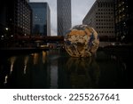 Small photo of Canary Wharf, London, England, UK January 2023. Canary Wharf Winter Light Show with DLR train passing behind behind.