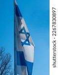 Israeli Flag On Flagpole With...