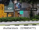 Small photo of SINGAPORE - 6 SEP 2022: The 12-storey ION Orchard mall, opened in 2009, has 8 retail and 4 car-park floors. It has over 400 stores and services and is linked to the Orchard MRT subway.