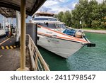 Small photo of SINGAPORE- 12 JAN 2024: This Ocean Raider at Tanah Merah Ferry Terminal is a ferry transports passengers to and fro Desaru from Singapore.