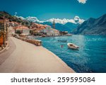 Harbour and boats in sunny day at Boka Kotor bay (Boka Kotorska), Montenegro, Europe. Retro toned image.