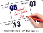 March 6. Hand writing text National Oreo Cookie Day on calendar date. Save the date. Holiday.  Day of the year concept.