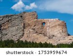 The face of the famous Native American Chief Crazy Horse begins to emerge from an ongoing construction project at a stone mountain in South Dakota.