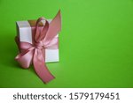 white gift box with pink ribbon ... | Shutterstock . vector #1579179451