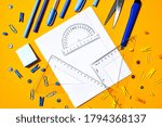 School supplies on yellow background, copy space, scissors, pen, paper clips, ruller, stickers. Back to school, Study at home