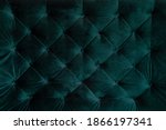background malachite green teal velvet capitone textile, suede, velor, with buttons, sofa back. Close up photo
