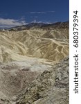Small photo of DEATH VALLEY, USA - AUGUST 8 2013: Zabriskie Point, a part of Amargosa Range located east of Death Valley in Death Valley National Park in California.
