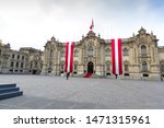 LIMA, PERU - JUL 28, 2019: Peruvian flags at traditional at presidential palace, in Lima, Peru (FIESTAS PATRIAS)