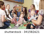 Small photo of Group Of Mothers With Babies At Playgroup