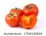 persimmon fruit red nature... | Shutterstock . vector #1704130834