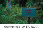 Small photo of Buffer zone notice board in the forest