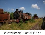 Rusty Old Steam Train Next To...