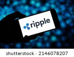 Small photo of Ripple editorial. Illustrative photo for news about Ripple - a real-time gross settlement system, currency exchange and remittance network. Novosibirsk,Russia - April, 7 - 2022