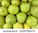 Close up photo of pomelos in...