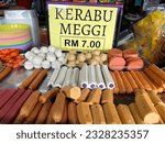 Small photo of Padang Besar, Malaysia - July 7, 2023 : food sold at the shop in padang besar known as Kerabu meggi translated as noodle salad with price tag