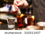 Barman stir alcohol. process of preparing a cocktail