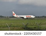 Small photo of Boyolali, Central Java, Indonesia-Nov 20, 2018: Lion Air, PK-LQI, Boeing 737 MAX 8, backtrack to runway 26 of Adi Soemarmo Airport