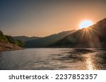 Beautiful sunset over Soyanggang Dam during cruise ship on Soyang river in the valley at Chuncheon, Gangwon do, South Korea