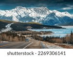 Small photo of Beautiful scenery of Road trip on highway with rocky mountains and frozen lake at Icefields Parkway, Alberta, Canada