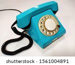 old vintage blue telephone on a ... | Shutterstock . vector #1561004891