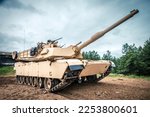 Small photo of ADAZI, LATVIA, JUNE 2016 - U.S. M1 Abrams tanks fire during the "Saber Strike" NATO military exercise