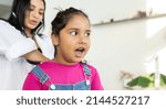 Small photo of female doctor indian pediatrician auscultation of child