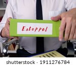 Small photo of Financial concept meaning Estoppel with phrase on the page.