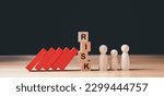 Small photo of Financial Crisis, Economic, Business risk management concept. Risk word on wooden block, domino crisis effect. Concept Risk, Crisis, Management, Assessment, Insurance, Security, Financial, Economic