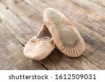 Ballet shoes  laying on rough...