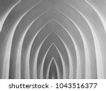 Curvilinear arch / niche / sitting places in black and white. Digitally reworked close-up photo of architectural fragment with stair-step structure. Abstract modern architecture / interior image