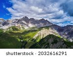 Swiss Alps view from Mount Pilatus, Lucerne Switzerland. Mounts with white gray clouds sky