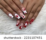 acrylic nails set with star design in burgundy and white gel nails color