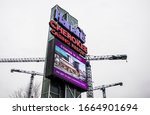 Small photo of Cherokee, North Carolina USA - March 2 2020: Harrahs gambling casino resort street digital sign with a message about a new Conference center that is under construction