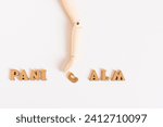 Panic calm concept wooden hand moves letter on light background